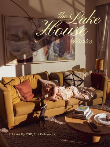 A high-quality, aspirational lifestyle image showcasing a family-friendly, luxury stay at Lakes by YOO in the Cotswolds. The photo captures a cozy, relaxed moment in a living space, emphasizing the comfort and aesthetic appeal of the accommodation.