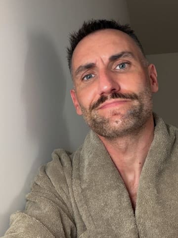 A selfie of a man wearing a bathrobe, taken at The Edinburgh Grand spa to promote a Vitamin C facial treatment.