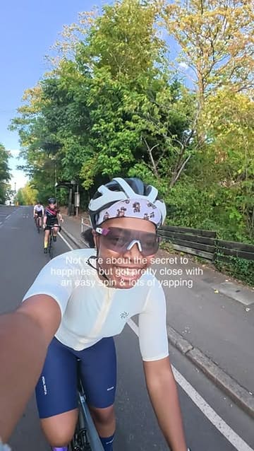 A selfie taken by a cyclist during a group ride, promoting an upcoming women's gravel cycling event that starts at a GAIL's bakery. The image captures the social and active nature of the event, using a personal, authentic style to encourage participation.