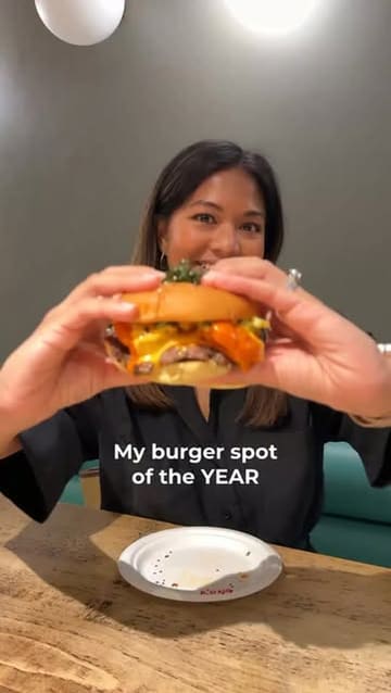 A fast-paced review of an Asian-inspired burger spot in Victoria, London, showcasing various smash burgers, a beef hotdog, and loaded fries.
