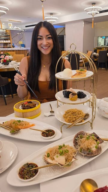 A review of Banquet 88, a modern Cantonese restaurant located in St Katharine Docks, showcasing their afternoon tea menu and waterfront setting.