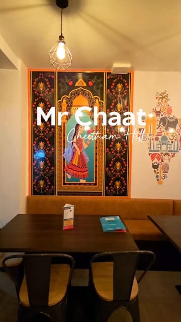 A promotional video for the new Mr Chaat branch in Cheetham Hill, featuring a variety of Indian street food, Desi Chinese dishes, and traditional curries. The video uses a montage format to showcase the restaurant's interior, menu, and a wide selection of dishes, accompanied by a voiceover describing the experience.
