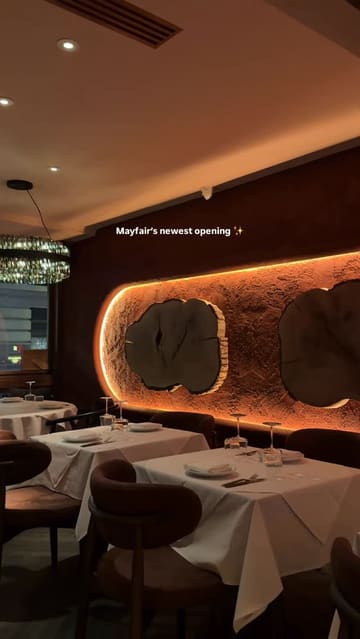 A promotional reel for a new Turkish Mediterranean restaurant in Mayfair, featuring shots of the interior design, open kitchen, various meze and grill dishes, and cocktails.