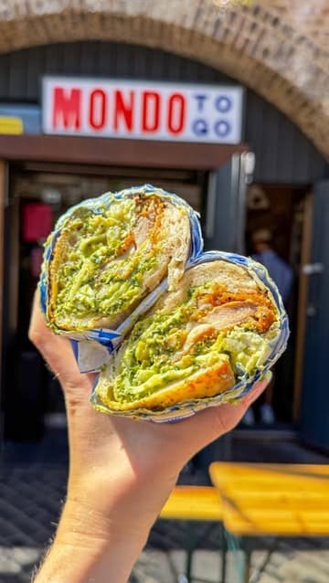 A fast-paced listicle video featuring six different hospitality venues in Deptford, London. The creator visits a bakery, a brunch spot, a sandwich shop, an Irish-Chinese takeaway, a wine bar, and a Vietnamese restaurant, providing quick glimpses of the food and atmosphere at each location.