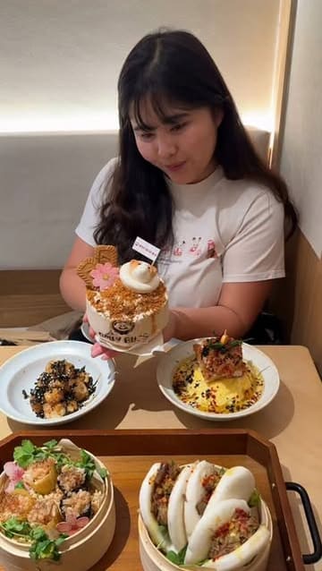 A short vlog-style video showcasing a visit to Belly Bliss in London's Chinatown, highlighting their cute corgi-themed shaved ice desserts and chicken katsu omurice curry.