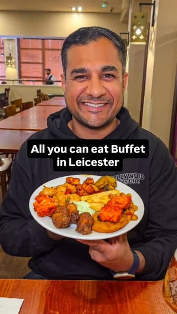 A fast-paced, engaging review of an all-you-can-eat Indian restaurant in Leicester, highlighting the variety of live cooking stations, the buffet spread, and the bar area.