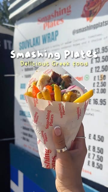 A short, punchy reel showcasing Greek street food items like gyros, halloumi fries, and a mezze box from Smashing Plates at a food festival.