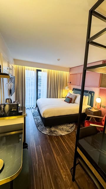 A promotional video for The Halyard hotel in Liverpool, showcasing the room design, amenities like the coffee machine and stocked fridge, the hotel's bar and restaurant, and a unique in-room cocktail trolley service.