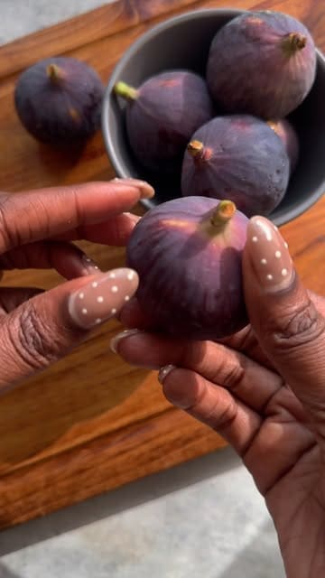 A short, instructional recipe video demonstrating how to make sticky fig and Camembert toast using gluten-free bread, fresh figs, honey, and walnuts.