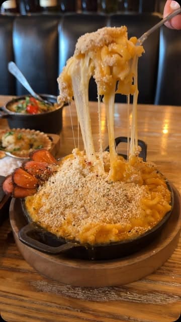 A montage showcasing the Brazilian churrasco dining experience at Fogo de Chão, featuring tableside meat carving, a diverse market table, and premium seafood additions like lobster and scallops.