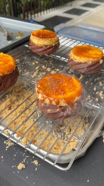 A montage showcasing the preparation and serving of unique cruller pastries at a market stall, featuring various toppings like crème brûlée, pistachio, and blackberry jam.