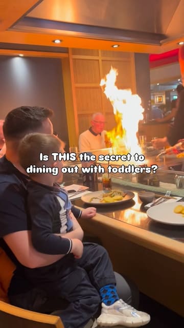 A promotional video for a teppanyaki restaurant highlighting its family-friendly 'Family Sundays' offering. The video features a chef performing cooking tricks with fire and food, while a toddler watches and engages with activity packs, demonstrating how the venue keeps children entertained during a meal.
