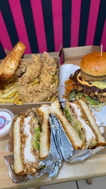 A short video review of Philly Express, a fast-food spot located inside a Premier corner shop in Wishaw. The video highlights the menu, including smash burgers, chicken tenders, and loaded donuts, while emphasizing the surprising location.