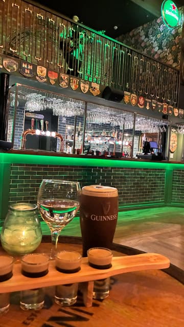 A short, upbeat video showcasing the atmosphere of Katie O'Brien's, a new Irish bar in Manchester. The reel features clips of the venue's interior, live music, a dance floor, and patrons enjoying drinks, specifically Guinness and baby Guinness shots.