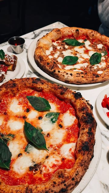 A short, punchy reel showcasing a visit to Paesano Pizza in Edinburgh. The video features close-up shots of various menu items, including pizzas, bruschetta, burrata, and a cheesecake dessert, set to music with text overlays.