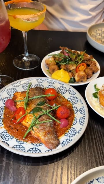 A short, engaging review of Kerala Canteen in Leeds, showcasing their South Indian tapas-style menu, including dishes like sea bass, beef curry pie, and calamari.