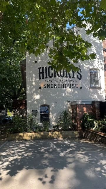 A promotional video showcasing Hickory's Smokehouse in Gateacre, highlighting its family-friendly atmosphere, live music, kids' movie room, and authentic BBQ food preparation.