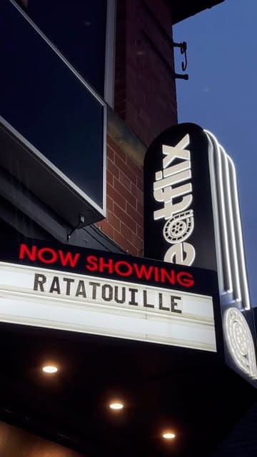 A video showcasing a cinematic dining experience at Eatflix, where guests watch the movie Ratatouille while being served a themed four-course meal and cocktails. The footage highlights the menu, the food dishes, and the movie playing on the big screen.