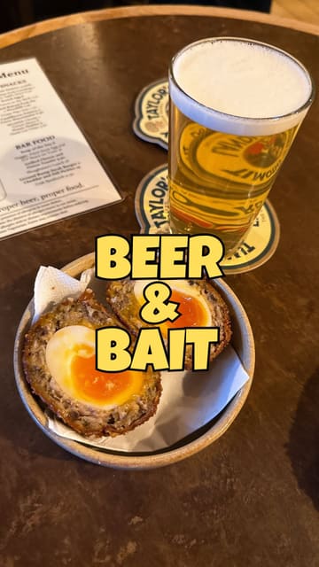 A vlog-style video showcasing a 'Beer and Bait' food tour in Newcastle. The creator walks through the city, visits various pubs, samples local ales, and tries bar snacks like Scotch eggs, providing an overview of the tour's experience and historical context.
