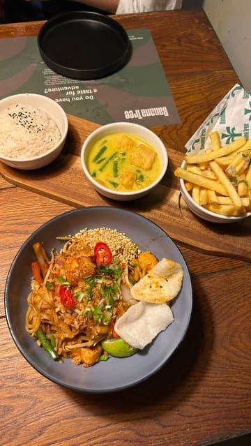 A promotional video for Banana Tree's 'Bottomless Bowls' menu, featuring a variety of Thai-inspired small plates, curries, and mocktails. The creator demonstrates the dining experience, highlighting the variety of dishes available and the value of the offer.