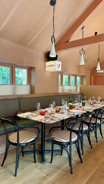 A montage showcasing a new restaurant called Lardon in the Cotswolds, featuring a variety of Mediterranean-inspired small plates, main courses, and desserts, alongside the venue's interior and atmosphere.