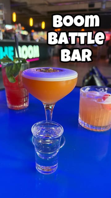 A fast-paced, energetic reel showcasing a visit to Boom Battle Bar, highlighting the various competitive socialising games available, the cocktail menu, and the bar food offerings.