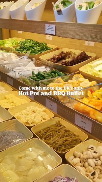 A short, engaging video showcasing the all-you-can-eat hot pot and BBQ buffet at DAIU in Cardiff Bay, highlighting the sushi selection, sauce station, and cooking experience.