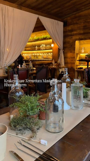 A creator documents their experience at a Kraken Rum terrarium masterclass at Rhum Tavern in London. The video shows the process of building a terrarium inside a rum bottle while enjoying cocktails, highlighting the venue's atmosphere and the interactive nature of the event.