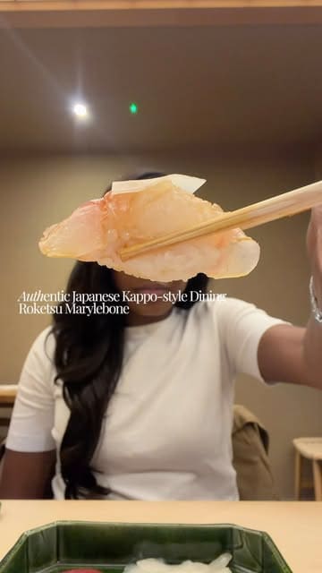 A review of a high-end Japanese Kappo-style dining experience at Roketsu in London, showcasing the preparation and presentation of a seasonal tasting menu.