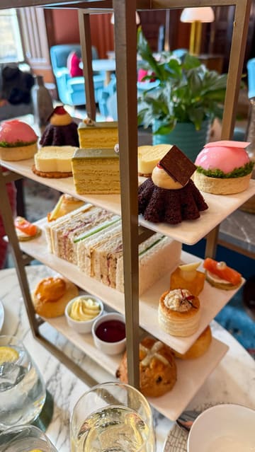 A high-quality vlog-style review of an afternoon tea experience at Mar Hall, showcasing the elegant venue interiors, the detailed food spread, and the overall luxurious atmosphere.
