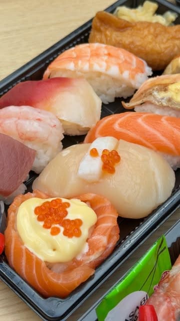 A fast-paced montage showcasing various food options at Bolton Market Food Hall, including sushi, katsu curry udon, egg waffles, and bubble tea.
