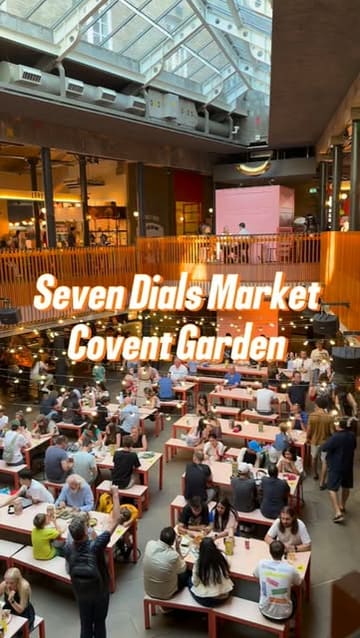 A short, energetic video showcasing a visit to Bleecker Burger at Seven Dials Market. The footage includes the market entrance, the menu, the cooking process on the grill, and the final presentation of burgers and fries.