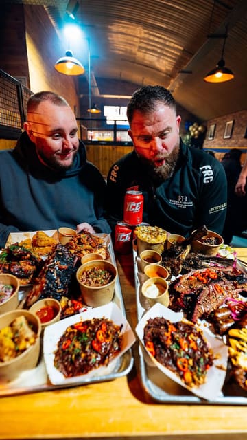 Two creators visit Joey's Smokehouse in Birmingham to review a large BBQ platter. The video features shots of the kitchen, the food preparation, and the creators tasting various items like brisket, ribs, and mac and cheese, providing their enthusiastic feedback throughout.