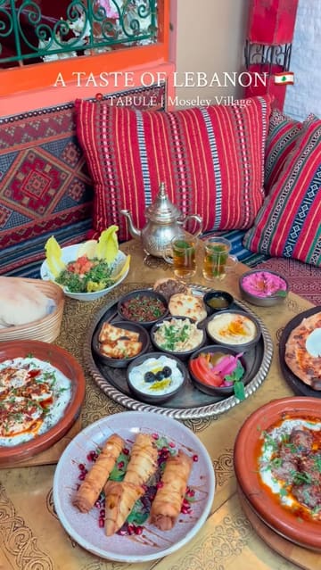 A short, polished promotional video for Tabulé, a Lebanese restaurant in Moseley Village. The video features a montage of various mezze dishes, tea pouring, and the restaurant's interior decor, set to music.