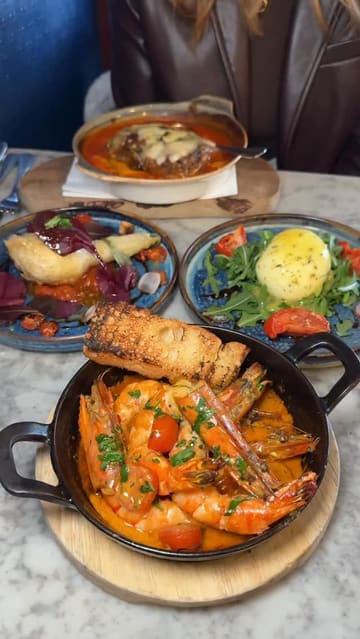 A fast-paced, engaging review of an Italian restaurant in Soho, London, showcasing fresh pasta preparation, signature dishes like bone marrow spaghetti and pistachio tiramisu, and the overall dining experience.