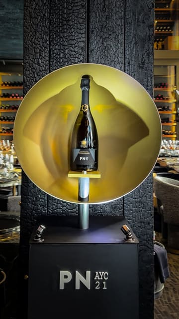 A montage video documenting a brand launch event for Bollinger Champagne at the venue JUL'S. The footage focuses on the product, the pouring process, and the guests attending the lunch event.
