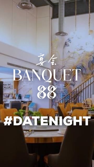 A vlog-style review of Banquet 88 at St Katharine Docks, featuring a variety of dishes including prawn toast, spring rolls, dim sum, crispy duck, noodles, fried rice, and scallops, with commentary on the food and the waterside location.