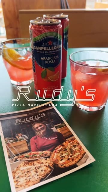 A short, music-led montage showcasing the pizza-making process, the interior of the restaurant, and the final dishes served at Rudy's.