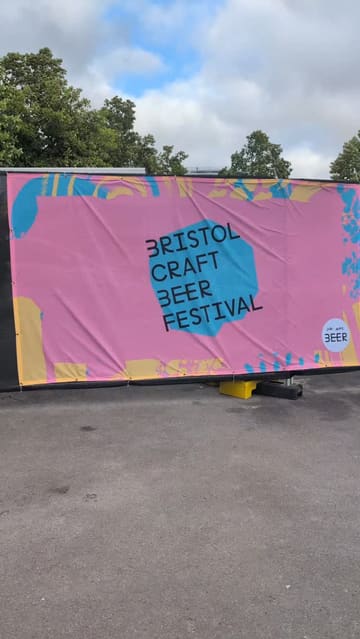 A fast-paced, handheld-style reel showcasing the Bristol Craft Beer Festival. The video features a variety of craft beers and ciders being poured and enjoyed, alongside shots of festival food including scotch eggs, a rice bowl, a burger, and pizza. The creator is featured throughout, highlighting the event's social atmosphere.