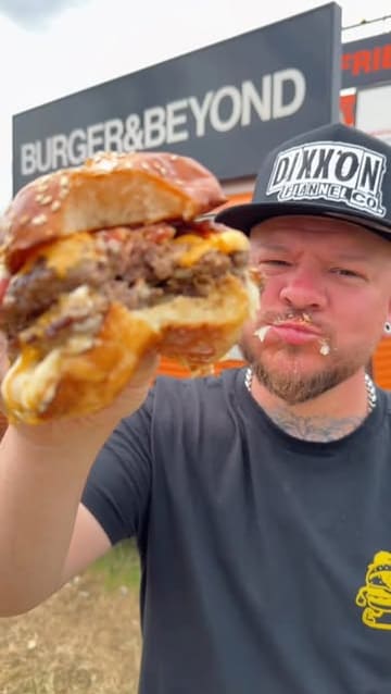 A high-energy festival food vlog featuring a tour of various street food vendors at Download Festival, showcasing loaded hash browns, fried chicken, burgers, and curries.