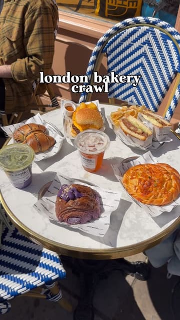 The creator takes viewers on a bakery crawl in London, visiting August Bakery in Battersea and Cafe Mama & Sons in Camden. The video features close-ups of various pastries, sandwiches, and drinks, with the creator providing commentary on the taste and quality of the items at each location.