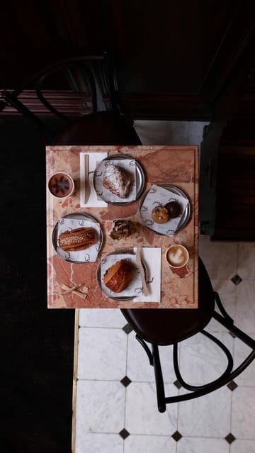 A short, well-edited promotional video for Fred bakery, featuring shots of the exterior, the kitchen, the pastry display, coffee preparation, and the final products.
