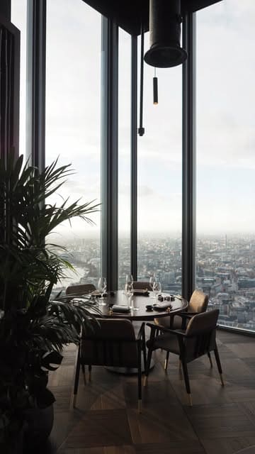 A promotional video for a bank offer featuring a montage of high-end dining experiences at various Gordon Ramsay restaurants, including Lucky Cat, The Savoy Grill, and Restaurant 1890.