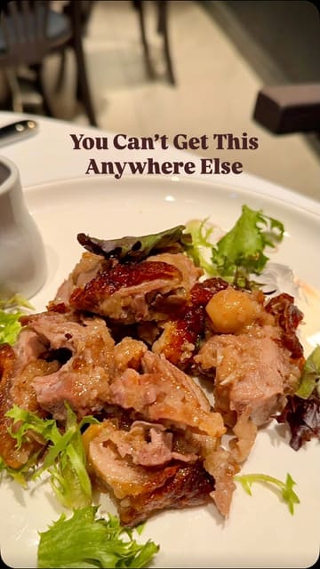 A promotional video featuring a visit to 3 Gorges in Fitzrovia, London. The creator highlights the restaurant's unique Chinese menu, specifically the Abalone Eight Treasure Duck, while showcasing the interior and various dishes including dim sum, pork ribs, and desserts.