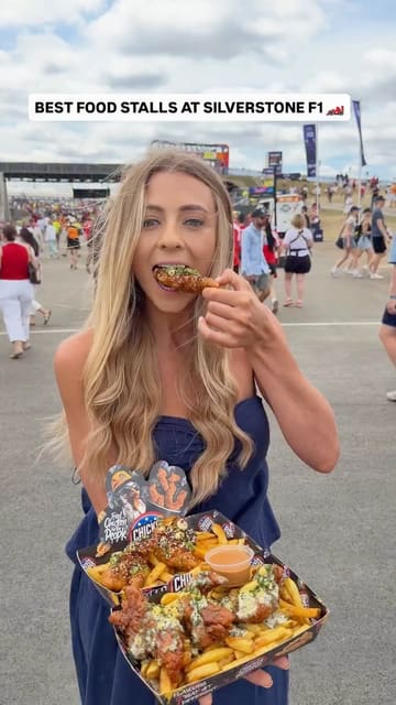 A fast-paced listicle video featuring a creator trying various food stalls at the Silverstone F1 Grand Prix. The video highlights specific dishes from different vendors, including chicken tenders, a steak bap, tacos, bao buns, and a pina colada, providing a helpful guide for event attendees.