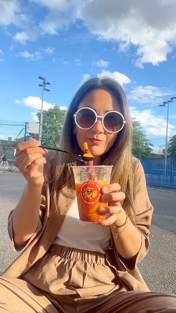 A vlog-style video capturing a casual lunch outing with family at a restaurant, featuring Indian-inspired dishes like samosas and pav bhaji, followed by a Mexican-style mango drink.