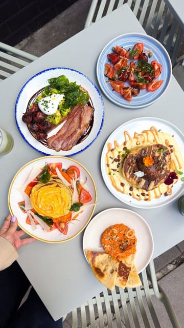 A short, punchy reel showcasing a new brunch menu at Half Cup, featuring close-up shots of various dishes like pancakes, avocado toast, and flatbreads, alongside coffee and matcha drinks.