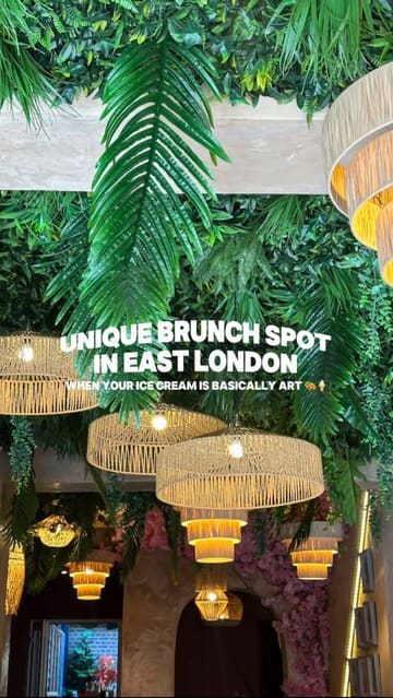 A short, punchy promotional video for Beans & Bites in Hackney, London, featuring close-up shots of their signature pistachio kunafa pancakes, scrambled eggs on sourdough, and refreshing drinks, set against the venue's lush, plant-filled interior.