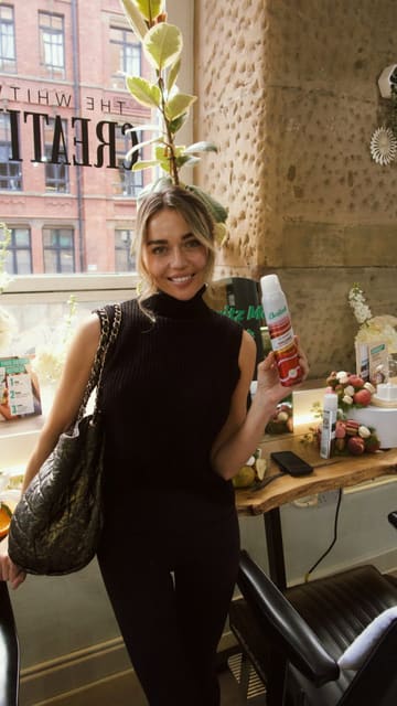 A creator documents her visit to a Batiste hair salon takeover event, showcasing the hair styling services, branded drinks, and product displays.