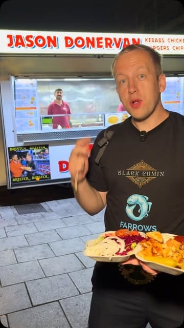 A creator reviews a chicken shish kebab from the Jason Donervan food van in Bristol, commenting on the portion size, freshness, and flavour balance.